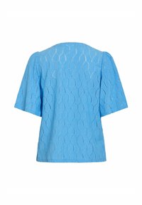 Blouse bleu à manches courtes avec un motif hexagonal texturé et une coupe ample, légèrement carrée, vue de dos.