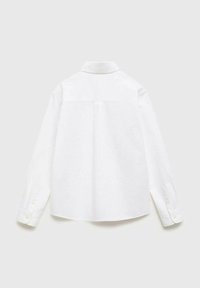 Vit långärmad skjorta i bomull med knapp-ner krage, ryggskjutsöm och knappade manschetter. Enfärgad textur utan mönster.