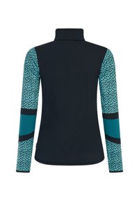 Langarm sportshirt met een hoge kraag. Zwarte body en turkooise mouwen met een bladachtig patroon en kleurblokaccenten.