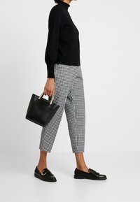 someday. Pullover - black