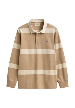 Bézs hosszú ujjú galléros póló, széles vízszintes krémszínű csíkokkal és egy kis hímzett logóval a bal mellkason.