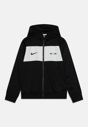 Czarna bluza z kapturem na zamek błyskawiczny z przednimi kieszeniami, białym poziomym paskiem na wysokości klatki piersiowej z logo Nike i napisem "AIR", oraz przymocowanym kapturem.
