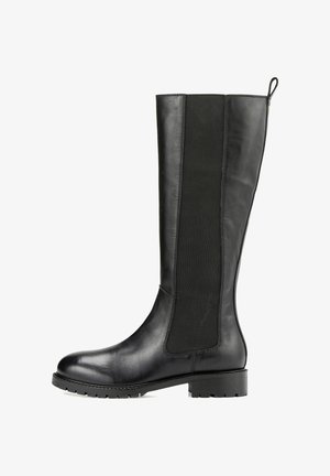 Botte noire en cuir avec panneau élastique latéral et tirant, semelle à crampons et talon bas épais.