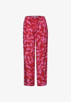 Pantalones rojos de corte holgado con cintura elástica y cordón, con un gran estampado floral en púrpura.
