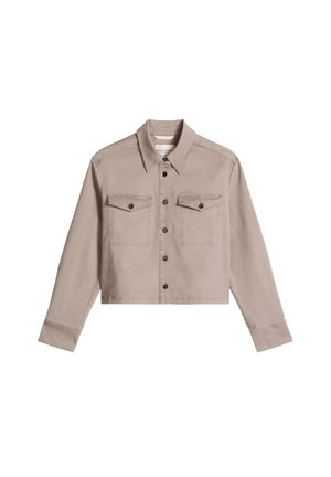 Bézs, rövidített dzseki hosszú ujjakkal, gombos elülső résszel, hegyes gallérral és két gombos mellkasi zsebbel.