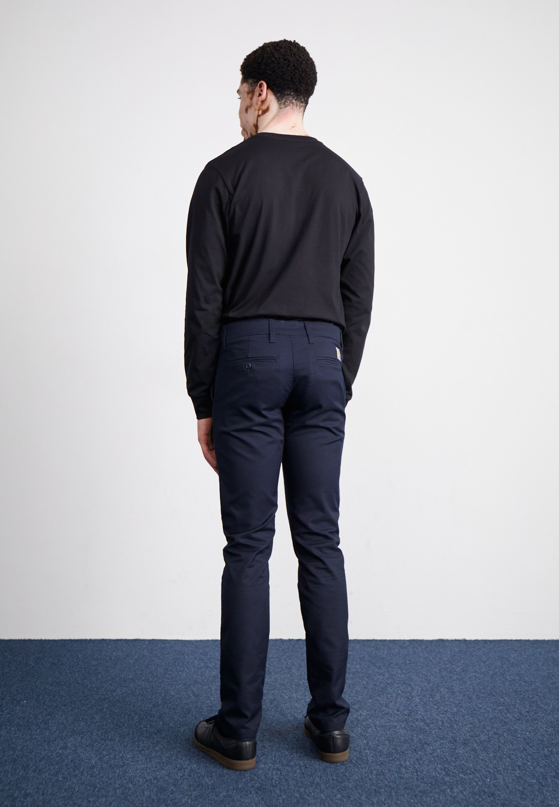 Carhartt WIP SID PANT - Trousers - dark navy rinsed/mottled dark