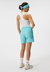 J.LINDEBERG Sports PRICILLA SHORTS - Sporta šorti - blue curacao