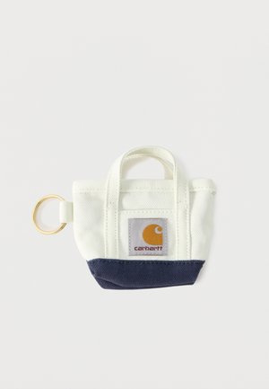 Mini fehér és tengerészkék színű kulcstartó táska két fogóval és elöl Carhartt logóval ellátva.