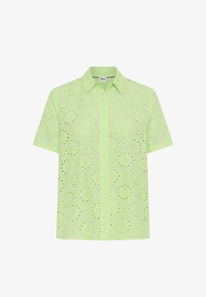 Camicia verde chiaro a maniche corte con bottoni, motivi floreali traforati e colletto appuntito.