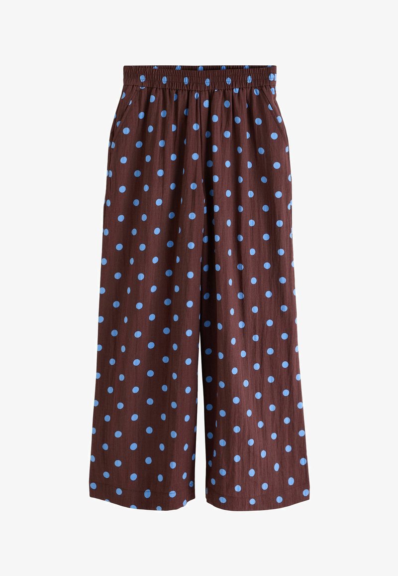 Smeđe široke hlače s gumenim remenom u svijetloplavim točkicama, naborima sprijeda i bočnim džepovima.