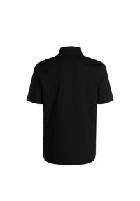 Maglietta nera a maniche corte con colletto classico. Realizzata in tessuto morbido con un taglio dritto e senza motivi o dettagli hardware visibili.