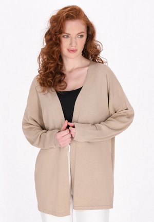 Cardigan bej, ușor, cu decolteu în V și mâneci lungi. Țesătura are un luciu subtil și o croială lejeră, având un design deschis în față.