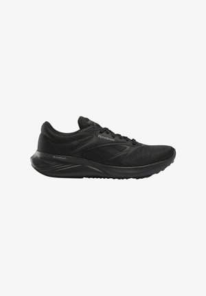 Chaussure de sport noire fabriquée en mesh respirant et en matériaux synthétiques. Elle comporte une semelle rembourrée et des accents texturés pour une meilleure adhérence.