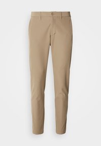 COMMUTER SLIM - Pantaloni - light pastel green