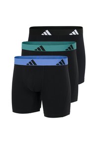 Czarne i kolorowe bokserki z elastycznymi pasami. Zawiera trzy pary: czarne z białym logo, morskozielone i niebieskie z czarnymi akcentami.