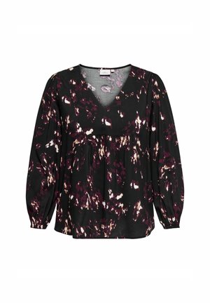Črna bluzica z V-izrezom, okrašena s cvetličnim vzorcem v odtenkih vijolične in bele barve. Dolgi, napihnjeni rokavi z nabranimi manšetami.