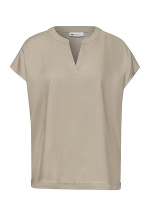 Beige Bluse mit kurzen Ärmeln, rundem Ausschnitt und einer kleinen V-förmigen Aussparung vorne, aus glattem Stoff.