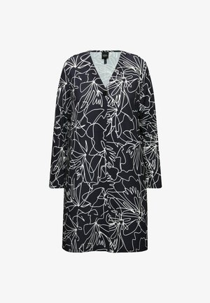 Námořnický modrý svetr s uspořádaným výstřihem do V, zdobený bílým květinovým liniovým vzorem. Dlouhé rukávy a jeden černý knoflík v přední části.