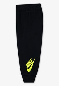 Nike Sportswear TOSS SET - Tracksuit bottoms - black