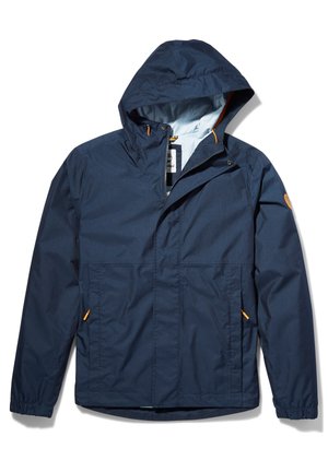 Veste à capuche bleu marine avec fermeture éclair frontale, poignets élastiques, poches latérales avec tirettes orange et doublure intérieure claire.