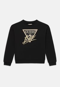 Black sweatshirt featuring a triangular logo with "GUESS" and "LOVE" in gold, textured accents, and a crew neckline. Soft fabric, long sleeves.