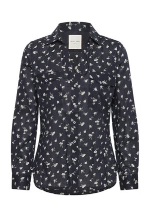 Chemise boutonnée à manches longues bleu marine avec un petit imprimé floral blanc et deux poches poitrine.