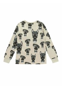 Long-sleeve shirt in light beige cotton with a repeat pattern of cartoon-style black dogs, featuring varied facial expressions and details.