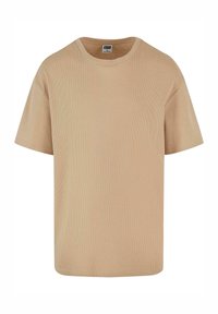 T-shirt beige à manches courtes en tricot côtelé avec col rond, étiqueté Urban Classics, présenté sur fond blanc.