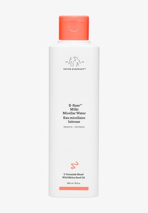 White bottle with a coral cap, featuring a black logo. Text on front indicates it contains micellar water and a blend of ceramides. 240ml.