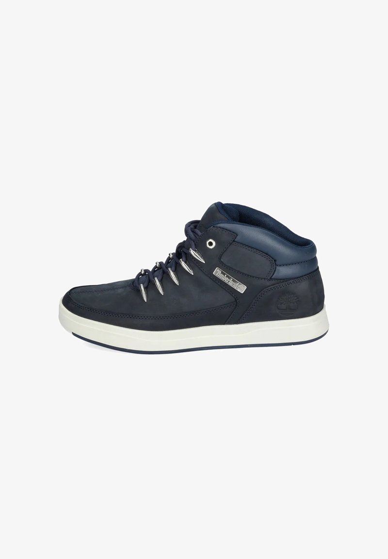 Dunkelblaues Leder-Halbschuh mit runder Spitze, weißer Gummisohle, Metallösen und Logo-Akzent. Mit gepolsterter Ferse für zusätzlichen Komfort.