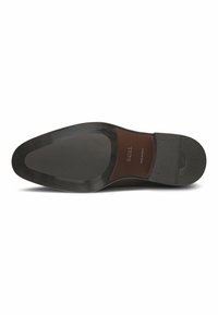 La suola delle scarpe presenta un elegante design nero con una superficie liscia, punta rinforzata e un sottile logo del marchio impresso in pelle marrone.