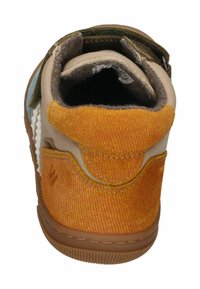 Tan and orange textile sneaker with a velcro strap, featuring a patterned orange back, padded collar, and textured rubber sole.