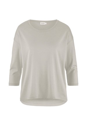 Top grigio chiaro a maniche corte con scollo rotondo e vestibilità rilassata. Tessuto morbido con orlo leggermente curvo.