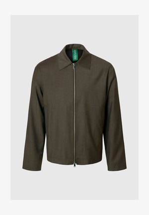 Bruin geruit jack met een brede kraag, lange mouwen en ritssluiting. Gemaakt van gestructureerde stof met een ontspannen, boxy pasvorm.