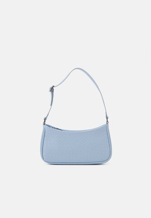 Light blue quilted shoulder bag with adjustable strap and top zipper closure, displayed against a plain light background.