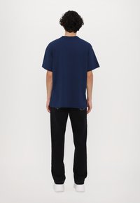 Versace Jeans Couture Apdrukāts T-krekls - blu