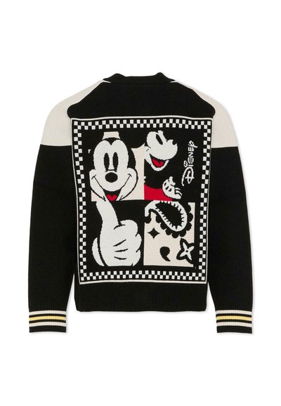 Pull noir en tricot avec un grand motif graphique représentant des personnages de dessin animé, bordure à damiers et accents crème sur les manches.