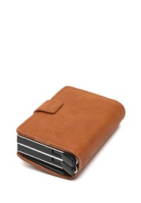 Tan leather wallet with a rectangular shape, a magnetic closure, and visible card slots. Smooth texture with stitched accents and a compact design.