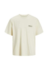 T-shirt en coton couleur crème, à manches courtes, col rond, arborant un petit logo vert "ORIGINALS" sur la partie gauche de la poitrine.