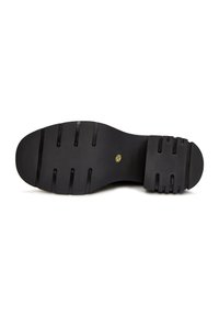 Schwarze Schuhsohle mit glatter Oberfläche, horizontalen Rillen und strukturierten Akzenten. Zentrales Logo in Gold. Runde Ferse mit ausgeprägten Rillen.