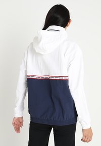 Tommy Jeans Větrovka - dark blue