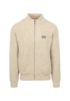 Beige knitted zip-up sweater with a high collar, ribbed texture, and a small logo patch on the left chest. Features contrasting orange lining.