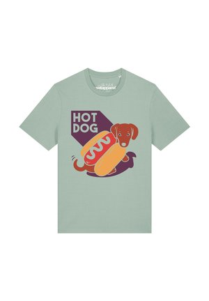 T-shirt vert clair avec un motif d'un chien teckel à l'intérieur d'un pain hot-dog et le texte "HOT DOG" au-dessus.