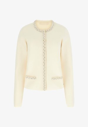 Kremowy kardigan wykonany z fakturowanej tkaniny, z okrągłym dekoltem, ozdobami w postaci kamieni wzdłuż przodu i kieszeni oraz dopasowanym krojem.
