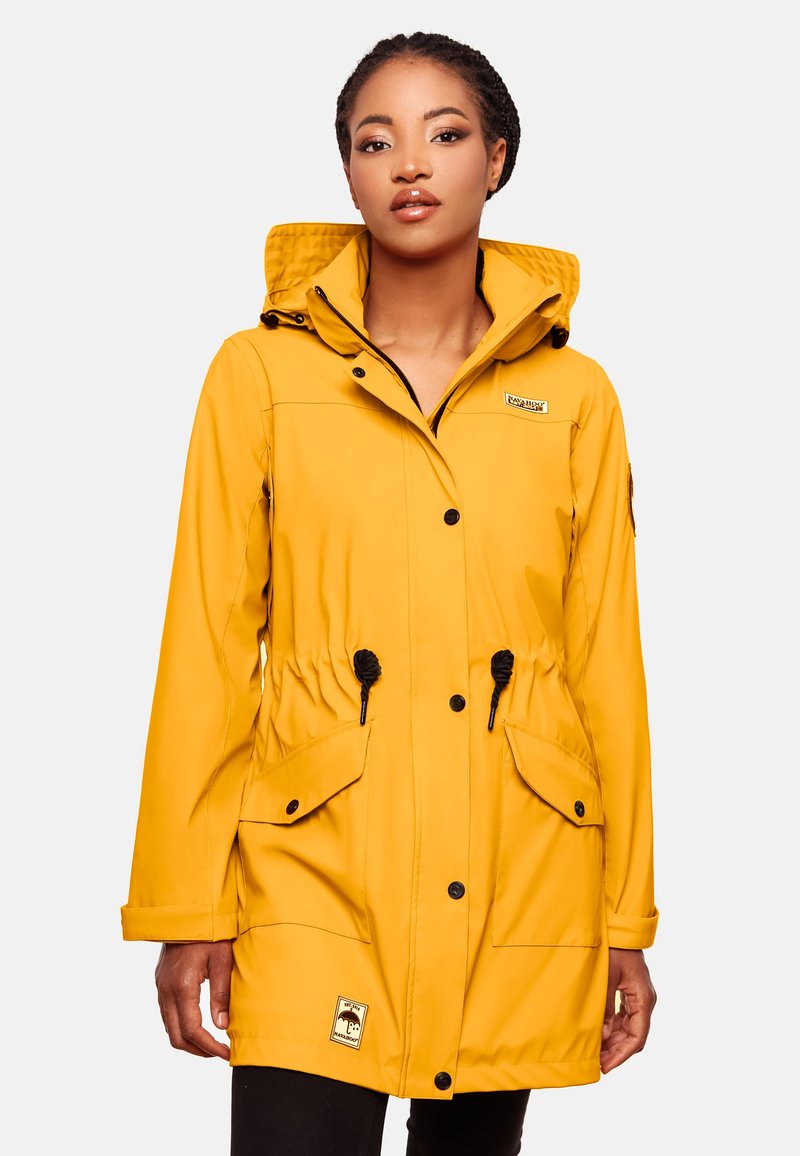 Yellow waterproof jacket with a hood, drawstring waist, button closure, and two front pockets. Smooth texture and durable material.