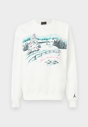 Sudadera blanca con gráfico de paisaje montañoso en azul y rosa, con un logo Jumpman negro en la manga izquierda.