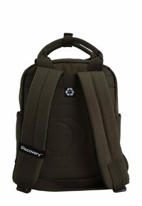 Brown fabric backpack with padded shoulder straps, top handle, circular stitching details, and a visible recycling logo. Brand tag visible.