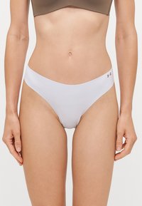 Witte nylon bikini broekjes met een lage taille, een gladde structuur en een minimalistisch ontwerp. Kenmerkt zich door een kleine logo-accent aan de zijkant.