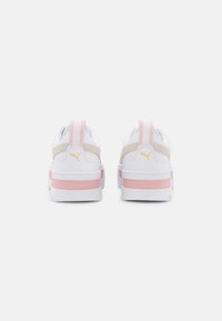 White sneakers with a smooth leather upper, pink and beige accents, and a textured back panel. Features a logo on the heel and a padded collar.