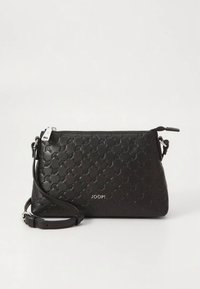 Black leather crossbody bag with embossed pattern, zip closure, adjustable strap, and a silver brand logo on the front.